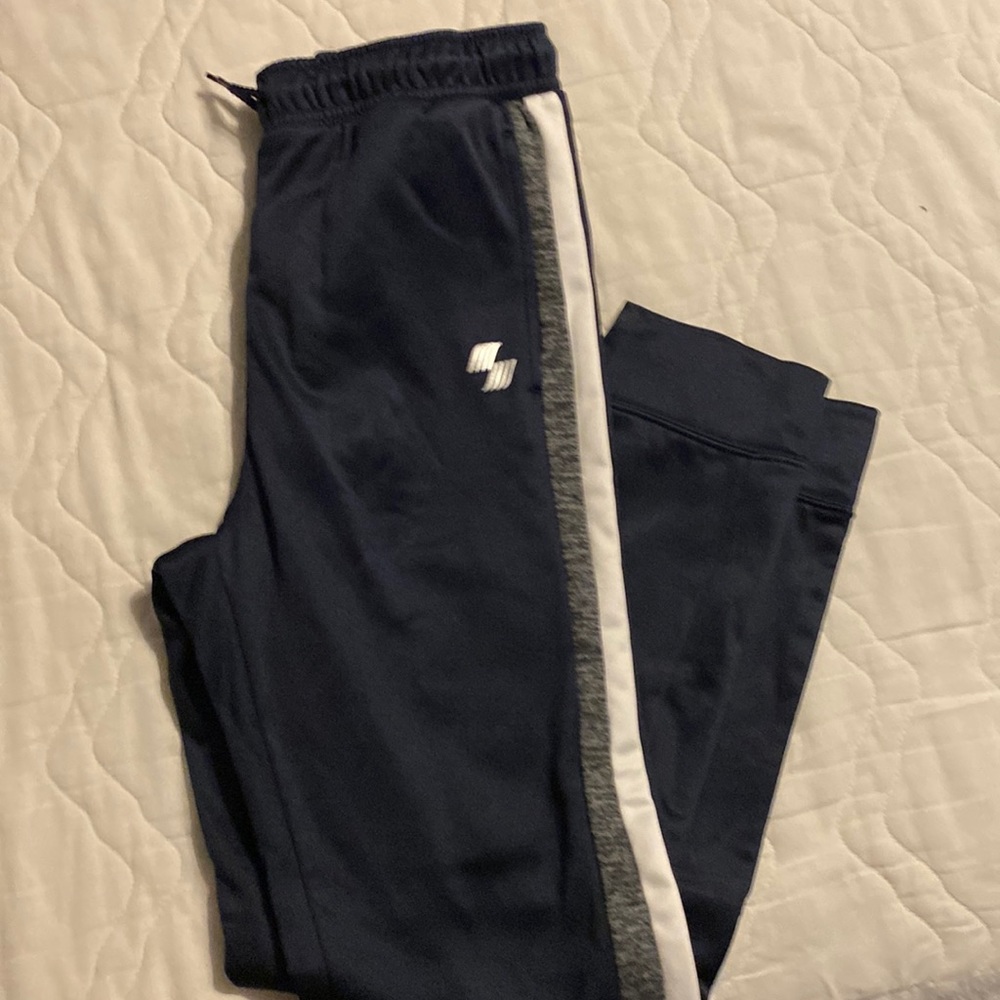 NWT blue/grey/white fleece lined nylon athletic pants. Size 14